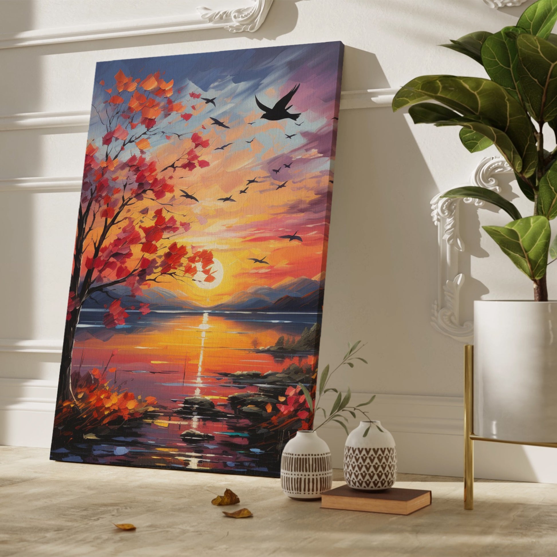 Framed canvas print of an impressionist-style autumn sunset by a lake with birds in flight and vibrant foliage.