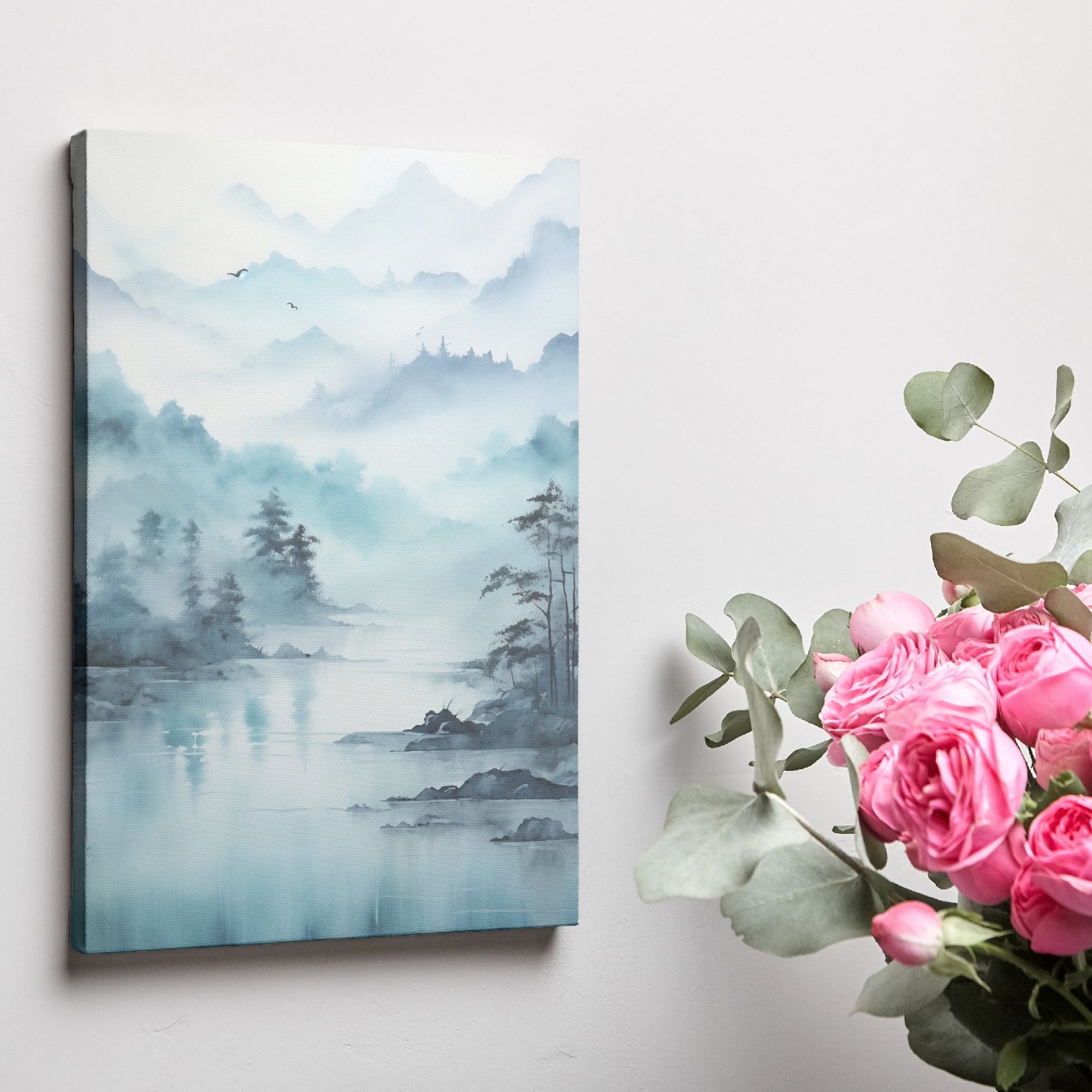 Framed canvas print of a tranquil watercolour landscape with misty blue mountains and serene lake