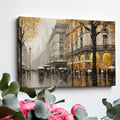 Framed canvas print of a Parisian streetscape with autumn leaves and rain