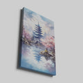 Framed canvas print of a traditional pagoda with cherry blossoms over tranquil waters, with modern skyline in the background