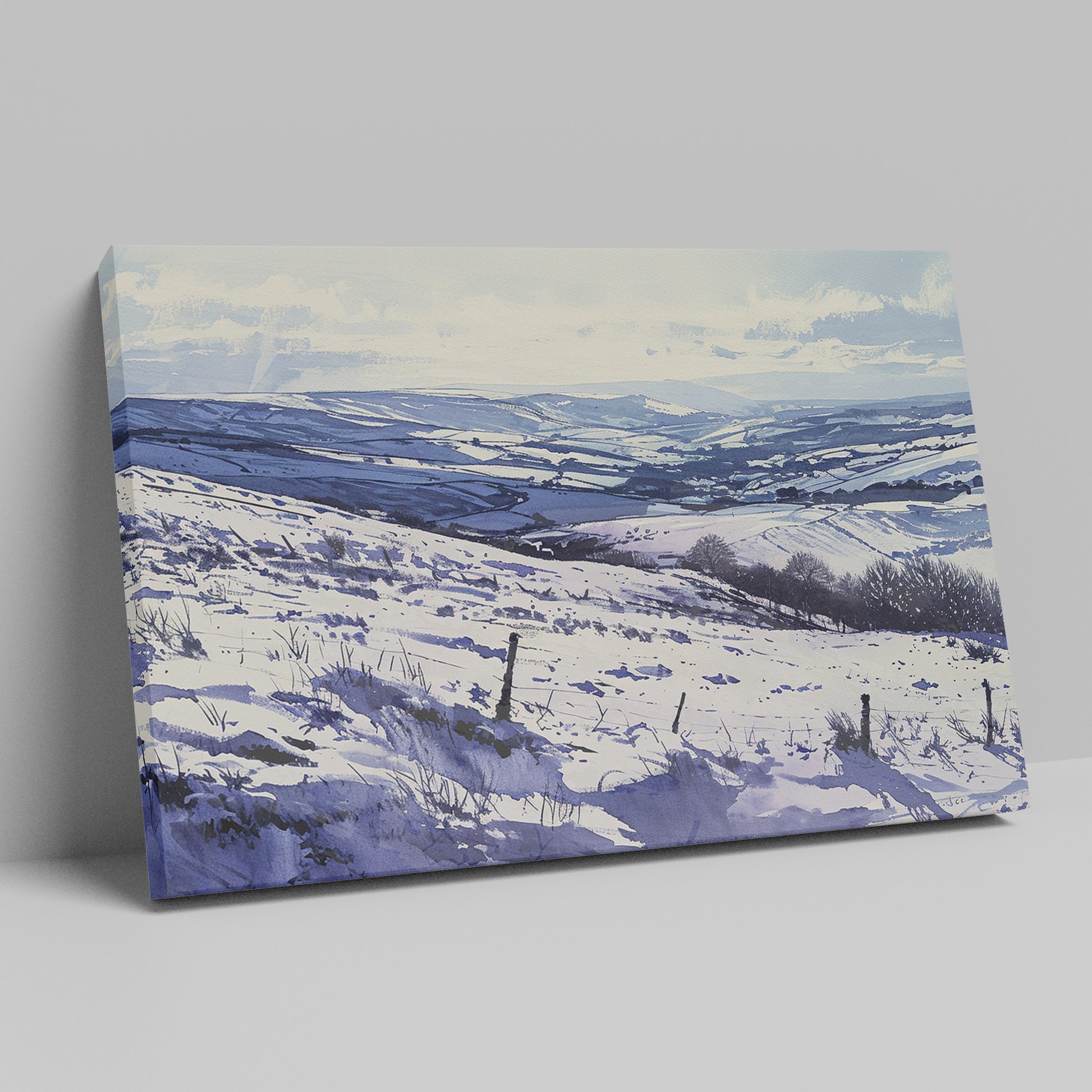 Framed canvas print of a snowy countryside landscape with rolling hills in cool blue tones