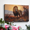 Framed canvas print of a majestic lion in an African savannah sunset