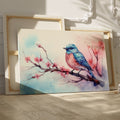 Framed canvas print of a vibrant bluebird on cherry blossom branch in watercolor