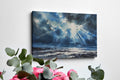 Watercolor canvas print of sunbeams shining through clouds onto the ocean