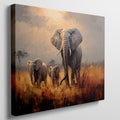 Framed canvas print of a family of elephants in a vibrant, golden savannah sunset