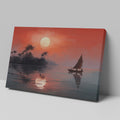 Framed canvas print of a tropical sunset with silhouette of sailboat and palm trees reflection on the water