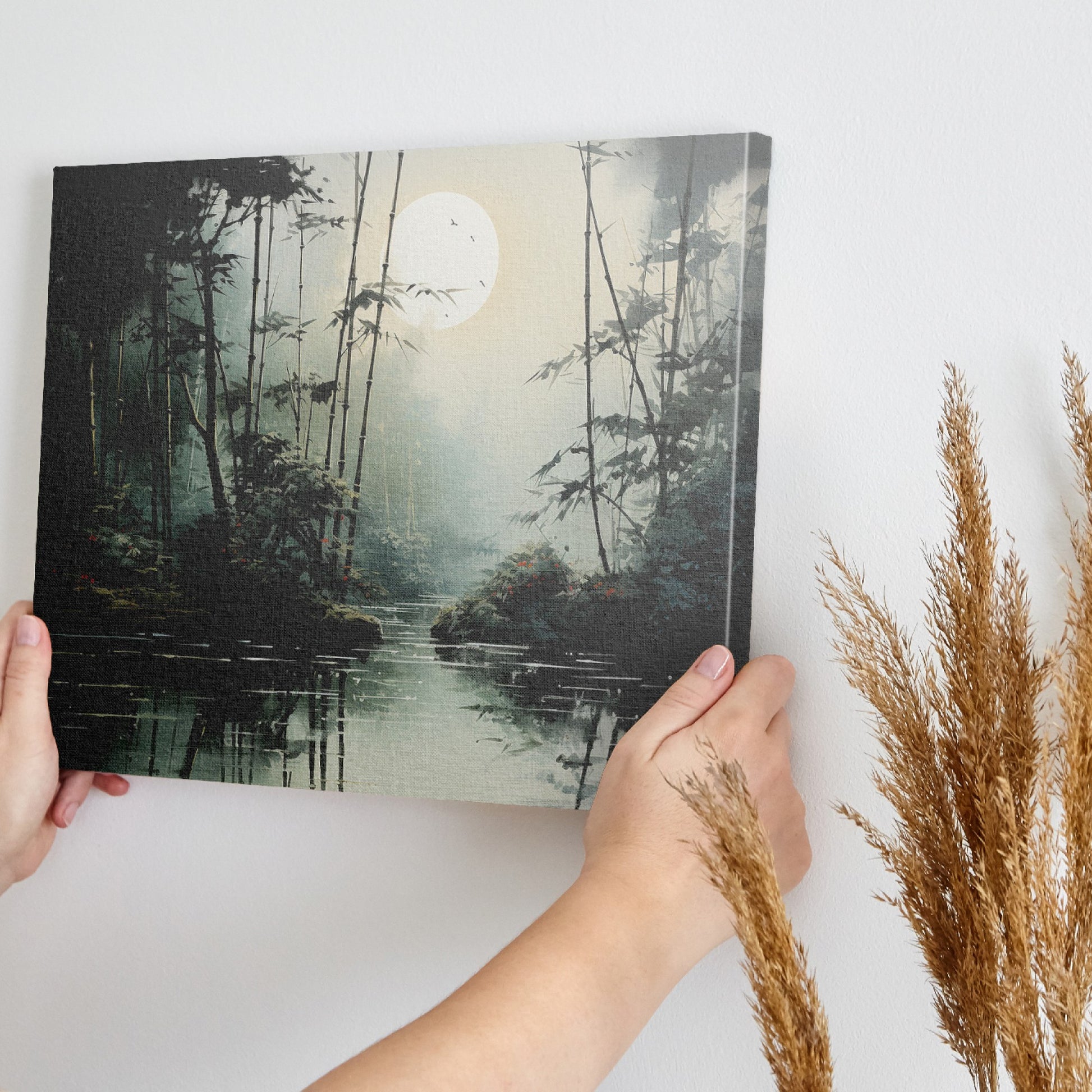 Framed canvas print of a serene bamboo forest under moonlight with water reflections and a misty ambiance