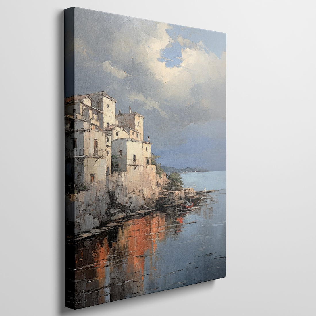 Framed canvas print of a Mediterranean coastal village during sunset with golden reflections on water