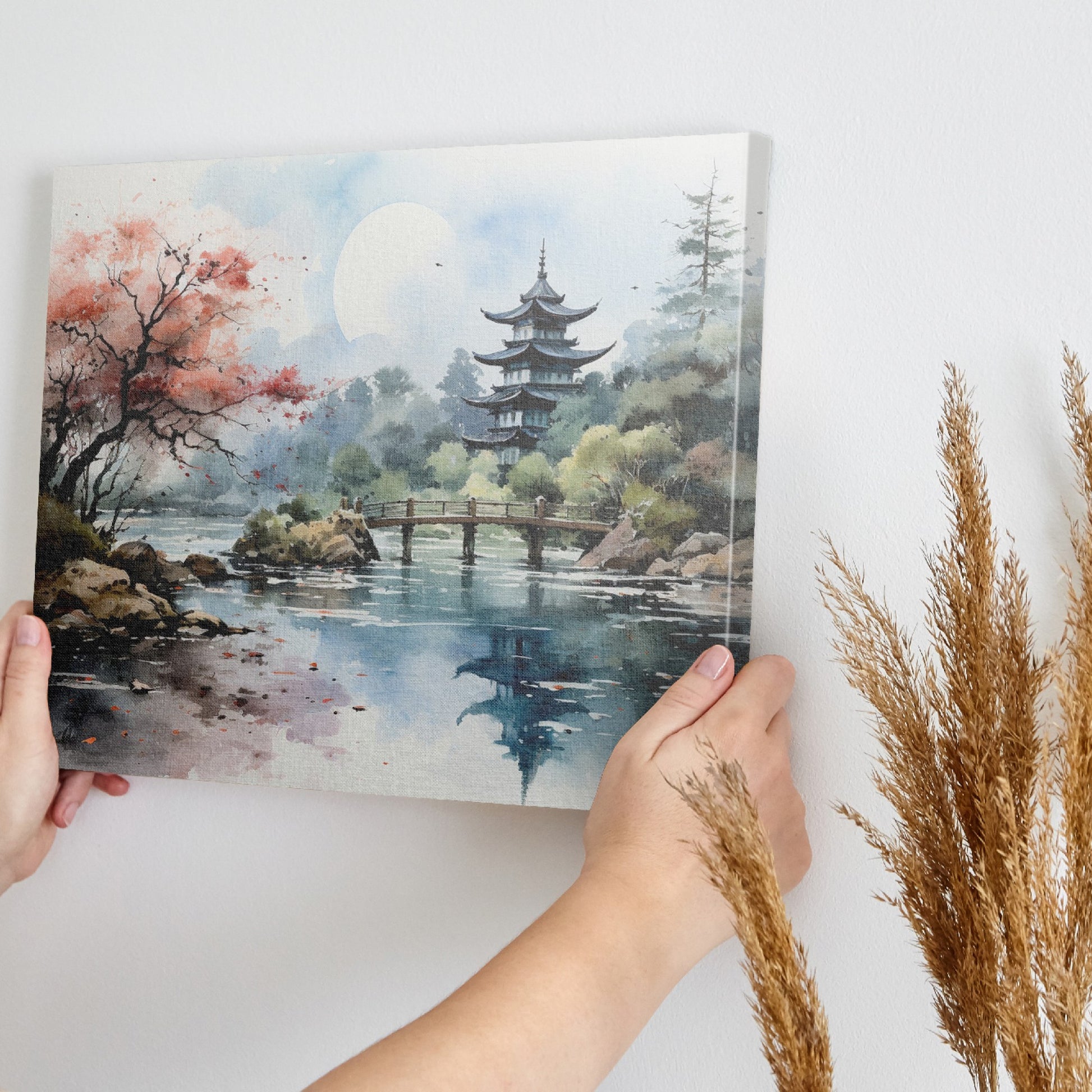 Framed canvas print of a traditional Asian pagoda by a lake with autumn cherry blossoms