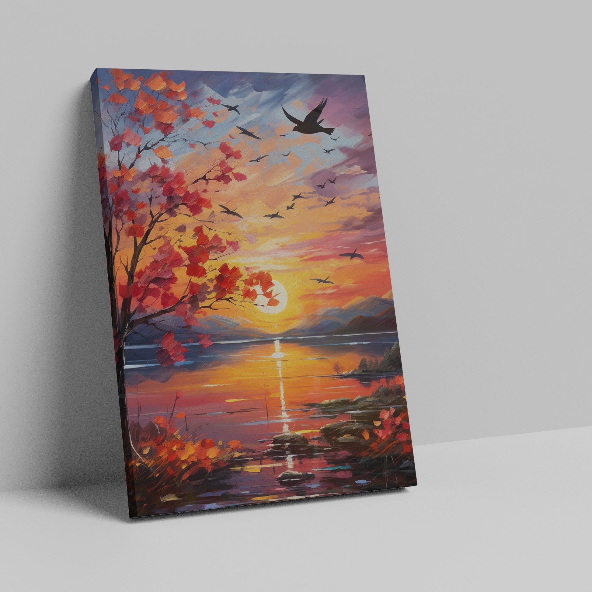 Framed canvas print of an impressionist-style autumn sunset by a lake with birds in flight and vibrant foliage.