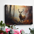 Framed canvas print of a majestic stag in an autumn forest with golden light filtering through the trees