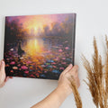 Framed canvas print of tranquil sunset over a lake with a thoughtful woman and colourful water lilies