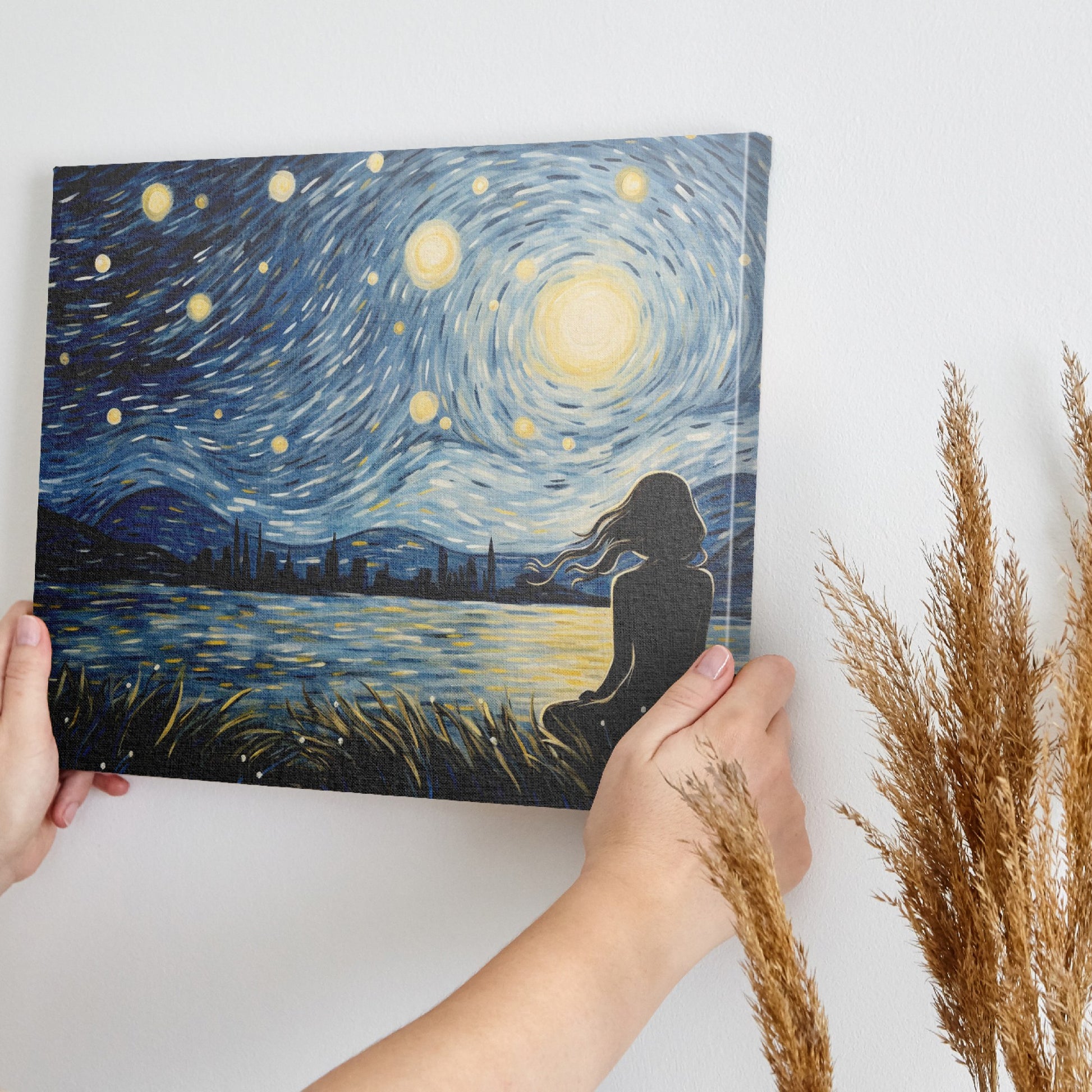 Framed canvas print of a Van Gogh-inspired starry night with a city silhouette and contemplative figure