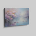 Framed canvas print of impressionist lakeside scene with blooming cherry blossoms and tranquil water reflections in pastel colours.