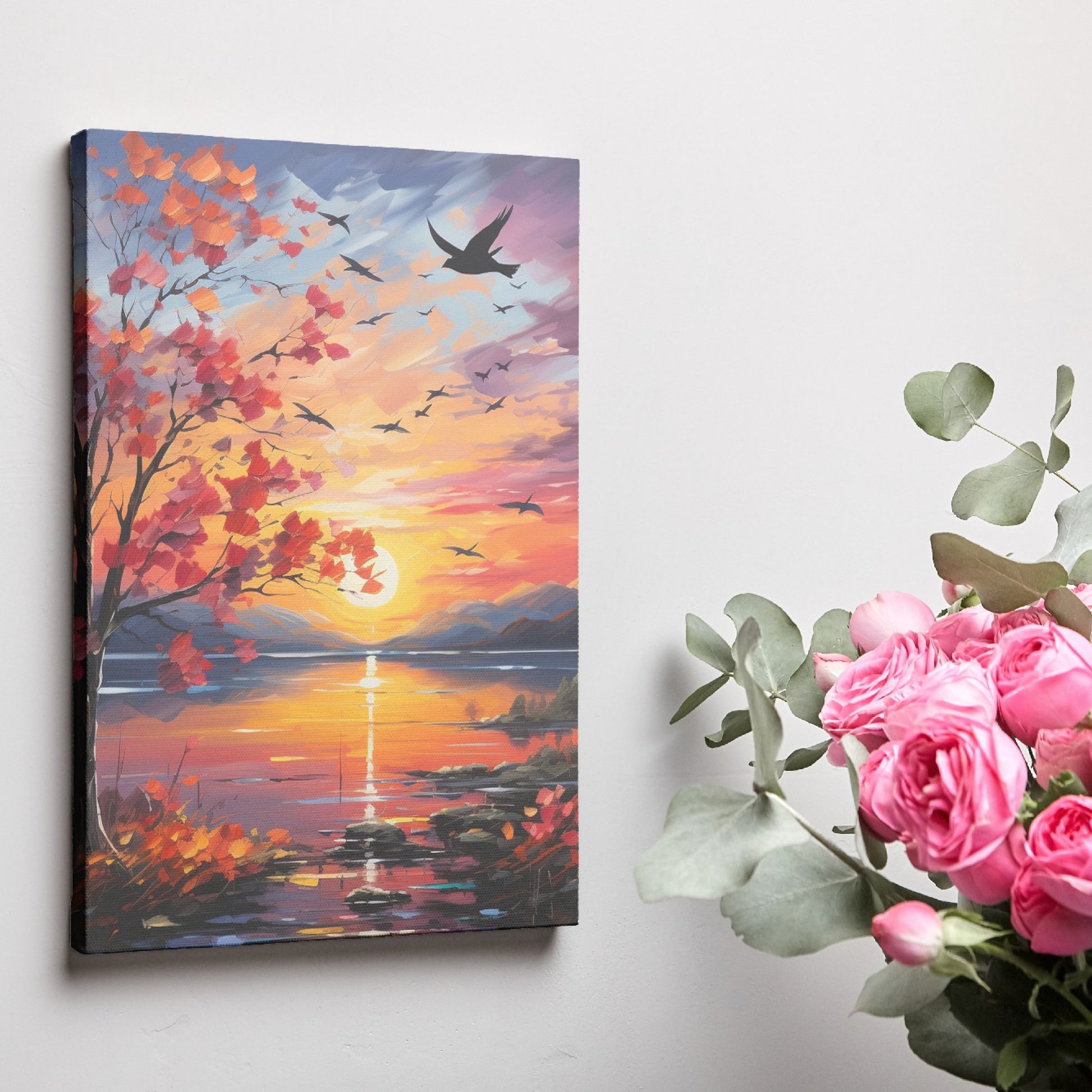 Framed canvas print of an impressionist-style autumn sunset by a lake with birds in flight and vibrant foliage.