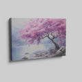 Framed canvas print of a cherry blossom tree by a lake with vivid pink flowers and tranquil blue waters