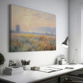 Framed canvas print of an impressionist painting with a sunrise over a tranquil countryside landscape