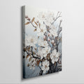 Framed canvas print of a meticulously illustrated cherry blossom branch with white flowers on a pale blue background.