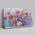 Framed canvas print of vibrant impasto floral artwork in purple, orange, and blue tones