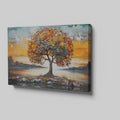 Textured canvas art of a tree with autumn leaves and a serene sunset in the background