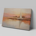 Framed canvas painting of a sailboat at sunset with orange and beige sky reflected in calm blue waters