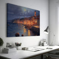 Framed canvas print of a moonlit Mediterranean coastal town with glowing street lamps