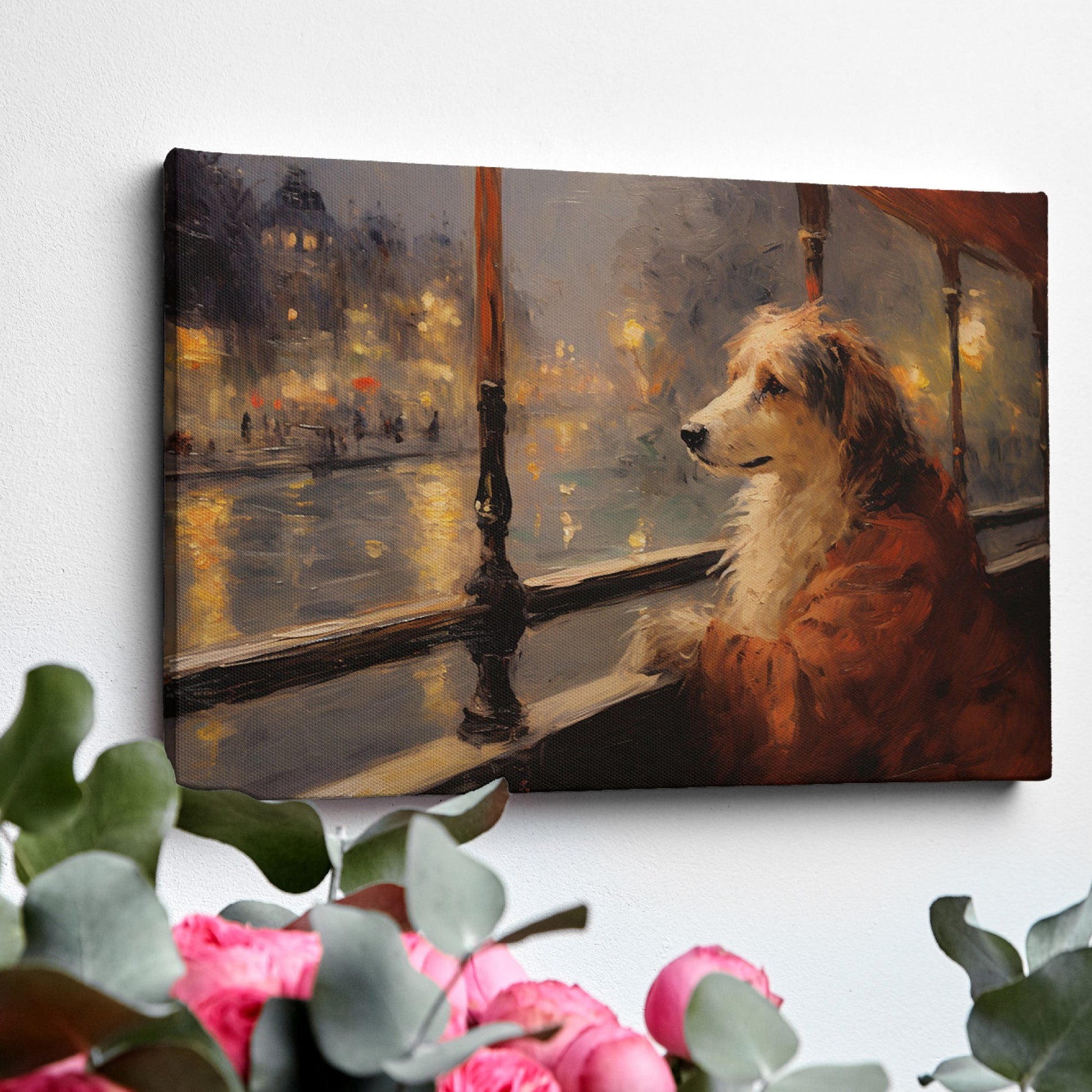 Framed canvas print of a dog looking out of a window at a city scene with warm, glowing lights