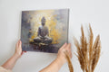 Framed canvas print of a serene Buddha in meditation with abstract warm and cool tones