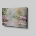 Framed canvas print of a serene impressionistic painting featuring a lake, azalea blooms, and a reflection of trees