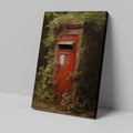 Framed canvas print of a vintage British red postbox entwined with green foliage in a forest