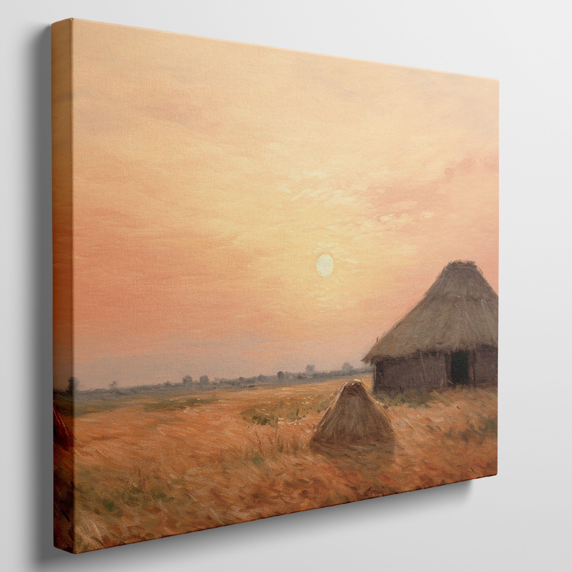 Framed canvas print of a rustic thatched cottage in a countryside landscape at sunset with warm golden and orange hues