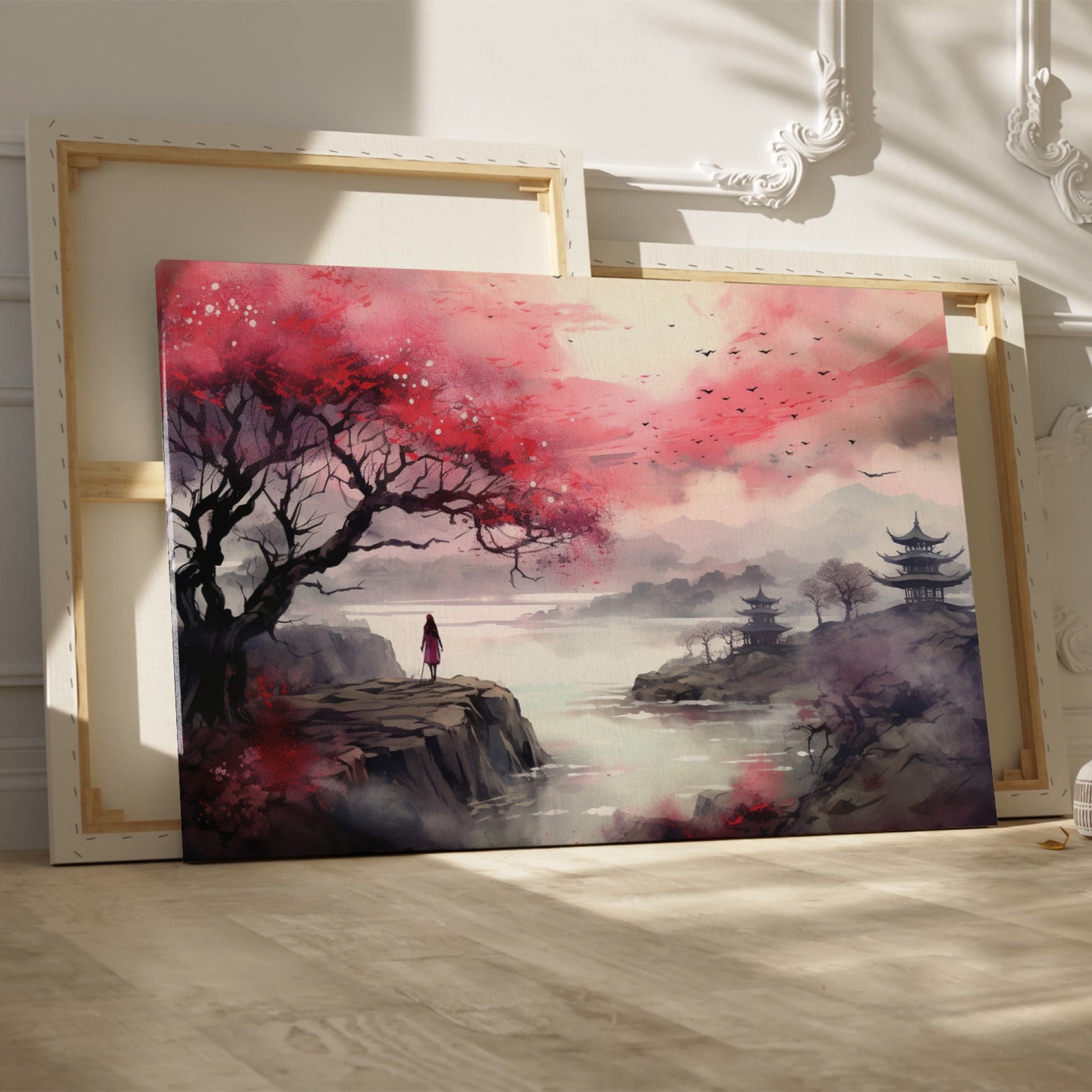 Framed canvas print of an oriental landscape with cherry blossoms, pagodas, and a silhouette of a person