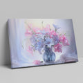 Framed canvas print of a realistic floral still life with pastel pink and blue flowers in a vase