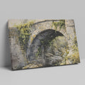 Framed canvas print of a rustic stone bridge with ivy in watercolour style