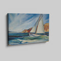 Framed canvas print of a vibrant sailboat sailing near a coastline with blue skies