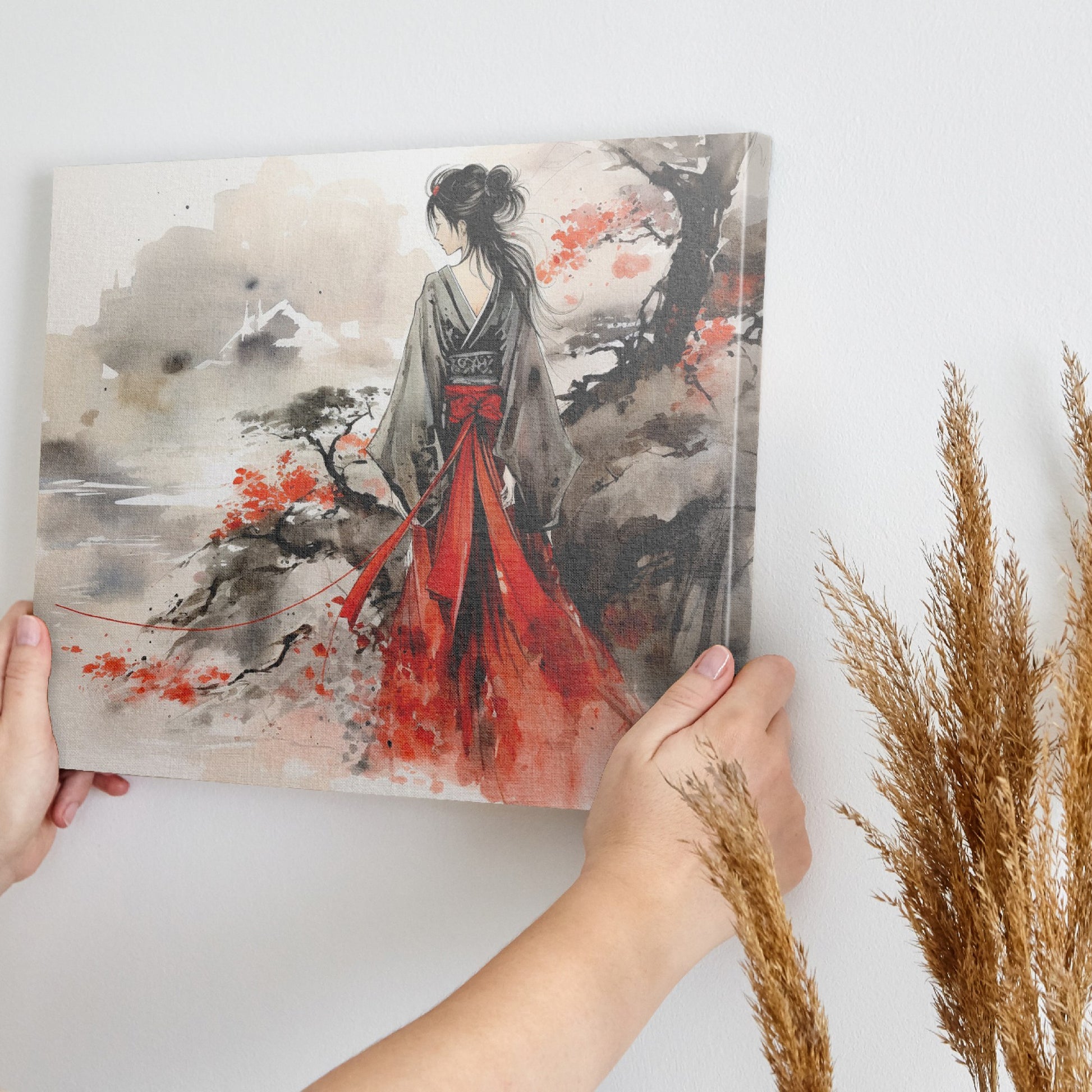 Framed canvas print of a traditional geisha in vibrant red, set against an oriental landscape with ink wash