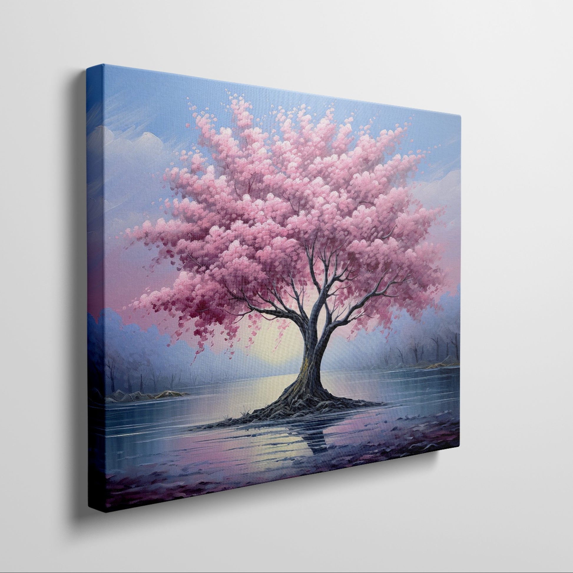 Framed canvas print of a blossoming cherry tree by the water with sunset reflection