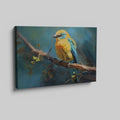 Framed canvas print of a vibrant blue and yellow bird perched on a tree branch with green leaves