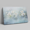 Framed canvas print of serene watercolor flowers with soft blue hues and water reflections