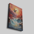 Framed canvas print of a waterfall and autumn trees with birds in flight against a sunset