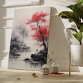 Framed canvas print of an ink wash painting featuring a bold red tree against a tranquil monochrome river landscape