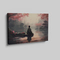 Framed canvas print of a serene digital painting with a figure sitting near water, reflecting cherry blossoms and a city silhouette