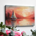 Framed canvas print of sailboats at sunset with orange and blue tones