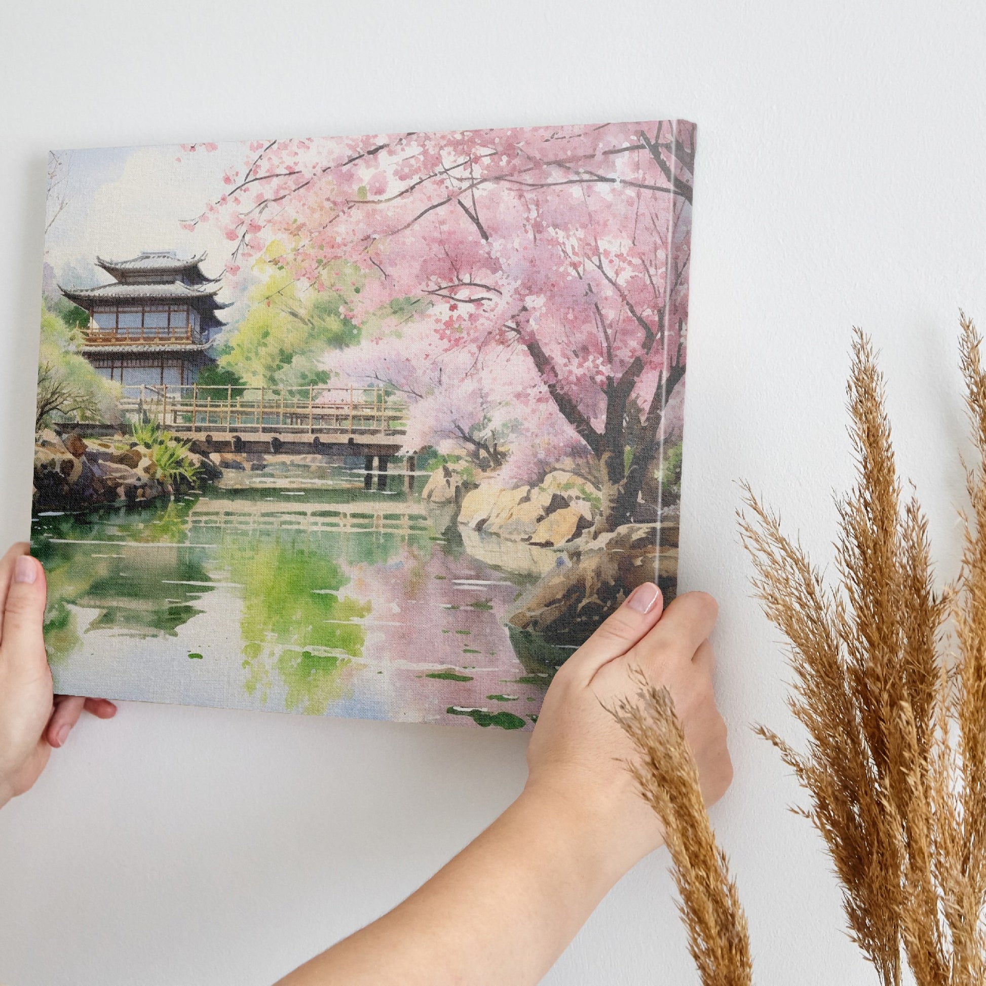 Watercolor painting of a Japanese garden with cherry blossoms, a pagoda, and a reflecting pond