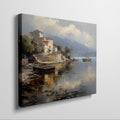 Framed canvas print of a Mediterranean coastal village with boats and serene sea reflections