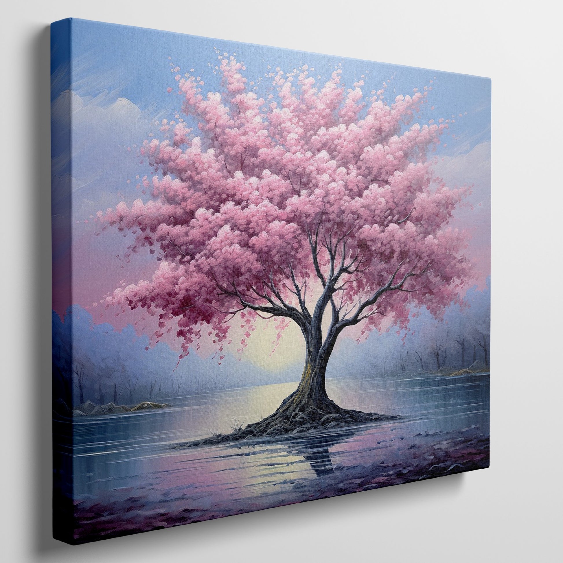 Framed canvas print of a blossoming cherry tree by the water with sunset reflection