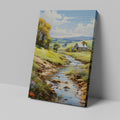 Framed canvas print of a vibrant rural landscape with a stream and cottage