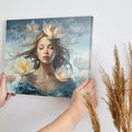 Framed canvas print of an ethereal woman with waterlilies and a dreamy blue palette