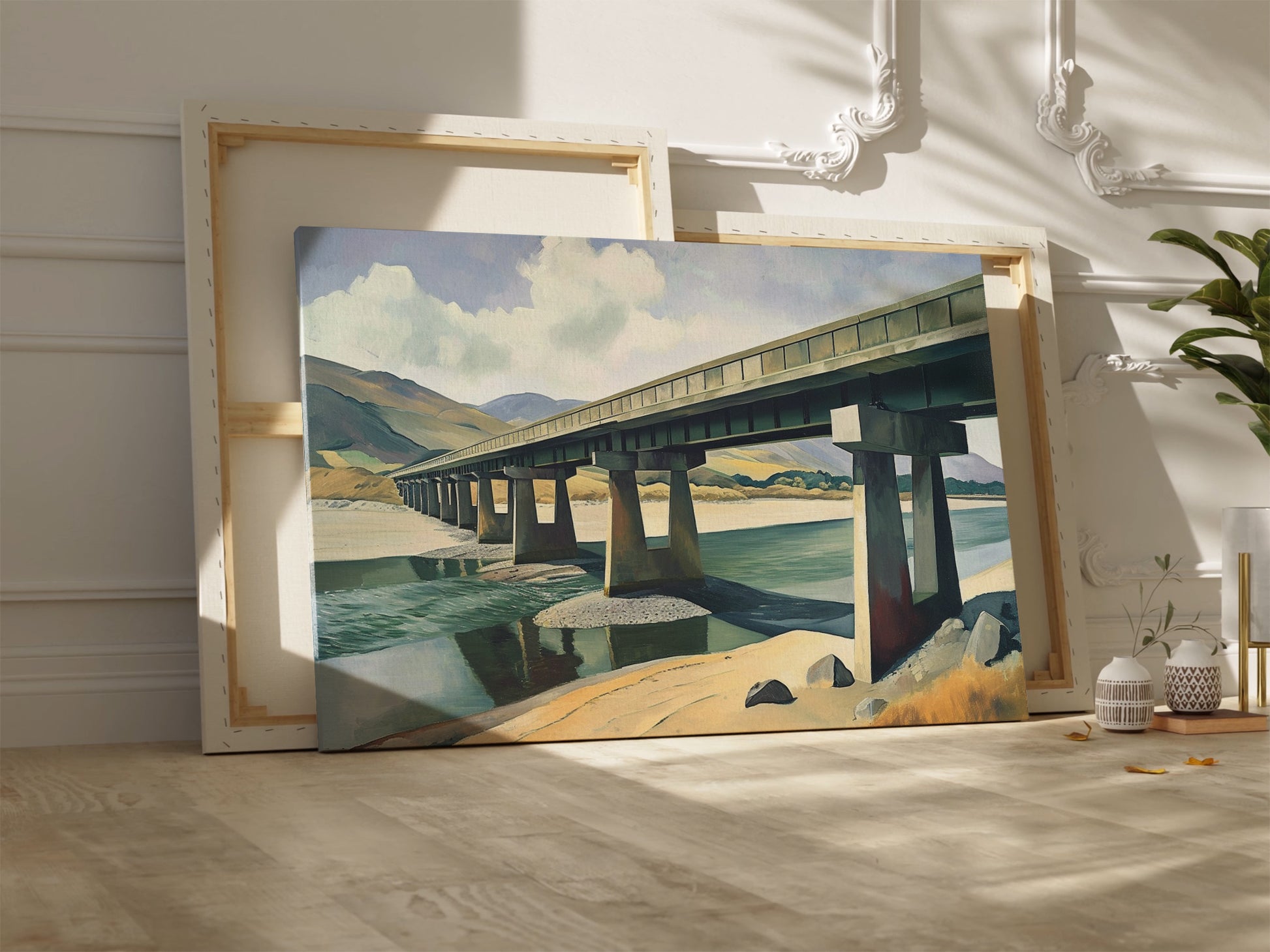 Framed canvas print of a serene countryside bridge over a river with mountain backdrop