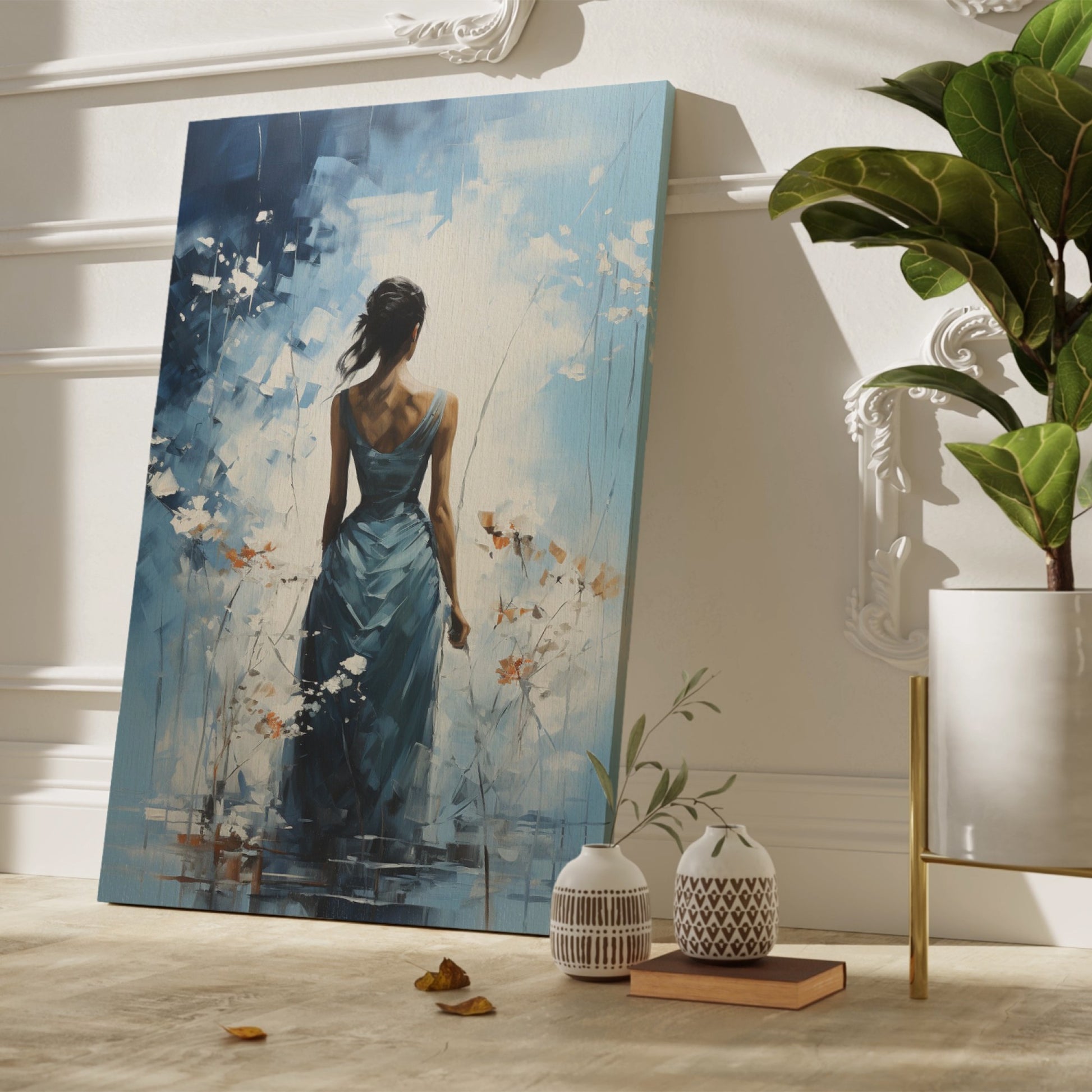 Framed canvas print of an abstract painting depicting a woman in a blue dress with a tranquil, flowy design against a blue and white background